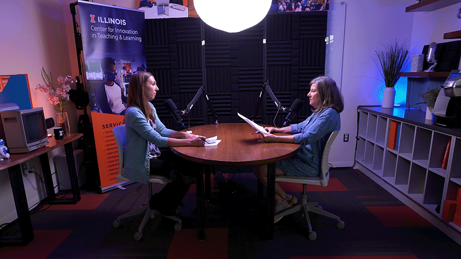 a view of people talking into microphones in the media hub