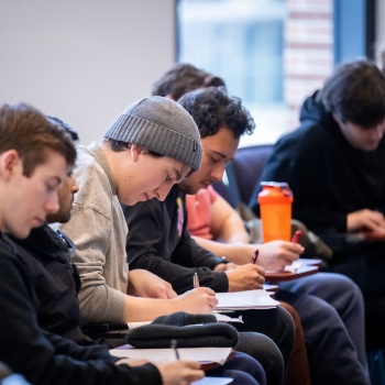 Students filling out ICES