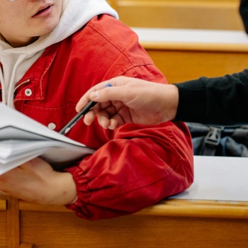 instructor helping student