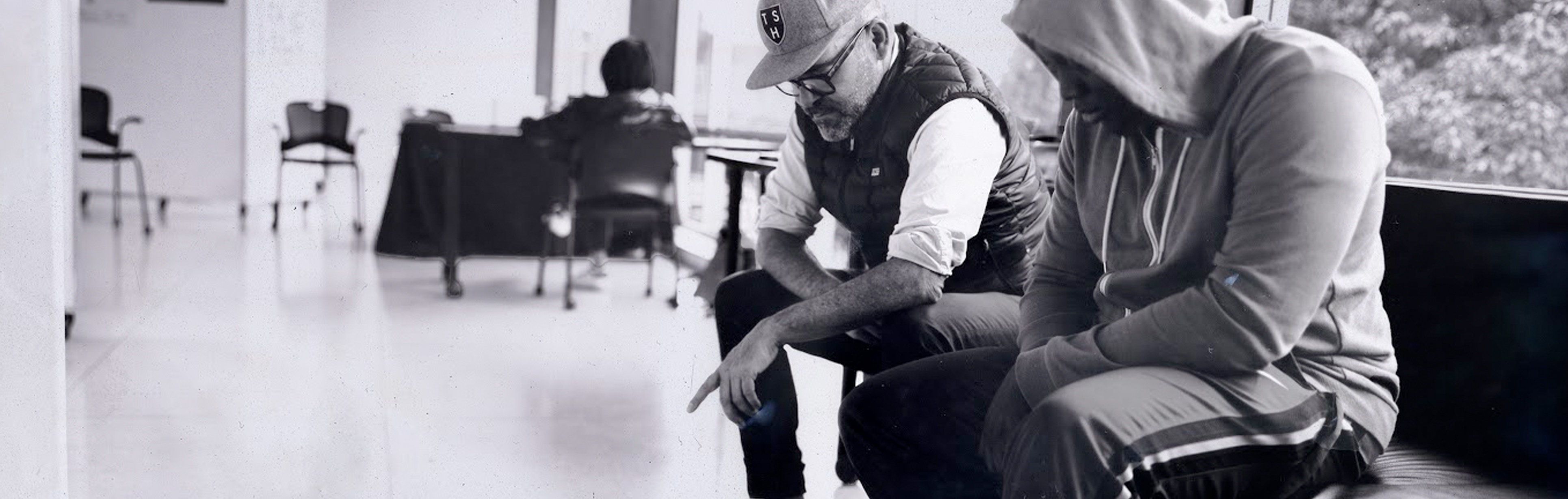 Two people sitting together